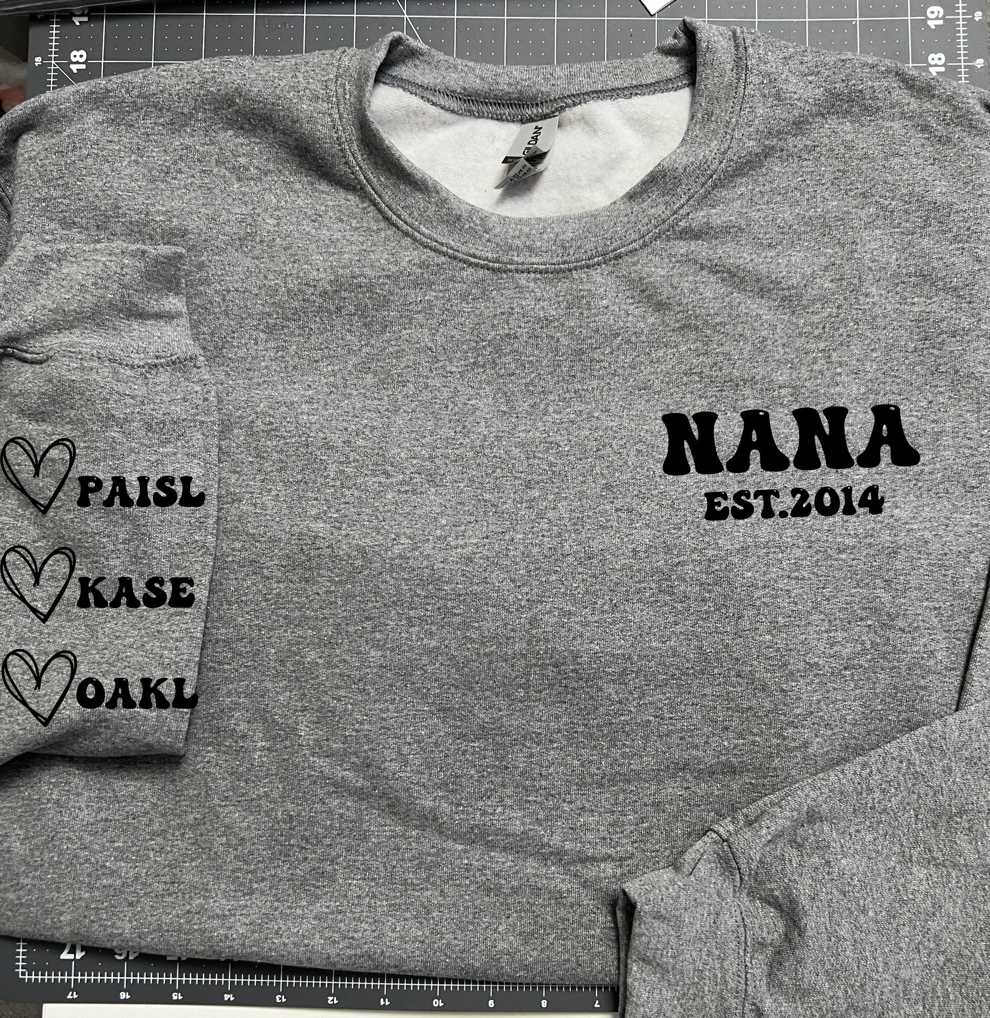 Customized Nana, Grandma, Mom, Dad I wear my heart on my sleeve sweater - MKcreativeprints